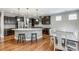 Modern kitchen featuring a large island and stainless steel appliances at 7006 Garden Hill Dr, Huntersville, NC 28078