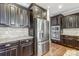Sleek kitchen with stainless steel appliances and granite countertops at 7006 Garden Hill Dr, Huntersville, NC 28078