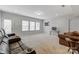 Spacious finished basement with recreation area and plenty of natural light at 7006 Garden Hill Dr, Huntersville, NC 28078