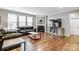 Living room with hardwood floors and a corner fireplace at 7006 Garden Hill Dr, Huntersville, NC 28078