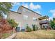 Two-story home exterior with deck and landscaping at 7006 Garden Hill Dr, Huntersville, NC 28078