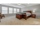 Spacious bedroom with carpeted floors and large windows at 7006 Garden Hill Dr, Huntersville, NC 28078