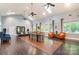 Spacious community room with hardwood floors, high ceilings and comfortable seating at 7006 Garden Hill Dr, Huntersville, NC 28078