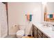Bathroom with vanity, toilet, and shower/tub combo at 831 College Ave, Shelby, NC 28152