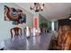 Bright dining room, showcasing a large table with seating for six and a view into the living room at 831 College Ave, Shelby, NC 28152