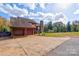 Two-story wood house with attached garage at 831 College Ave, Shelby, NC 28152