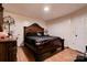 Large bedroom with a king-size bed and dark wood furniture at 831 College Ave, Shelby, NC 28152