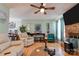Living room with hardwood floors, fireplace, and comfortable seating at 831 College Ave, Shelby, NC 28152