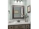 Bright bathroom with vanity, mirror, and neutral color scheme at 119 42Nd Avenue Nw Dr, Hickory, NC 28601