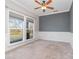 Bright office with neutral walls and carpeting, featuring wainscoting at 9538 Skybluff Cir, Huntersville, NC 28078