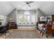 bedroom with built-in bunks and window seat at 16500 Green Dolphin Ln, Cornelius, NC 28031
