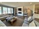 Open concept living room with fireplace and built-in shelving at 4367 Reed Creek Dr, Sherrills Ford, NC 28673