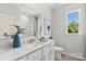 Bright bathroom with a vanity, toilet and shower/tub combo at 4375 Reed Creek Dr, Sherrills Ford, NC 28673