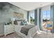 Charming bedroom featuring a serene wall mural and natural light at 4375 Reed Creek Dr, Sherrills Ford, NC 28673