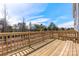 Spacious deck with wooden railings overlooking a wooded area at 4375 Reed Creek Dr, Sherrills Ford, NC 28673