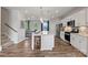 Modern kitchen with white cabinets and center island at 4375 Reed Creek Dr, Sherrills Ford, NC 28673