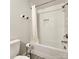 White tiled shower and bathtub combo at 4915 Christopher Run Dr, Monroe, NC 28112