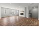 Living room with hardwood floors, fireplace and stairs at 7117 Brookview Ln, Sherrills Ford, NC 28673