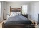 Bedroom with a queen-size bed and window at 201 Langhorne Dr, Mount Holly, NC 28120