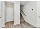 Bright entryway with stairs and neutral toned flooring at 303 Grove Gate Ln, Indian Trail, NC 28079