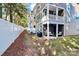 Private backyard with a patio and wooded area at 303 Grove Gate Ln, Indian Trail, NC 28079