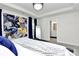 Spacious main bedroom with a king-size bed and ensuite bathroom access at 303 Grove Gate Ln, Indian Trail, NC 28079