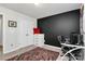 Home office with a desk and comfortable chair at 303 Grove Gate Ln, Indian Trail, NC 28079