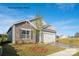 One-story home with stone and gray siding, and a two-car garage at 8039 Plymouth Dr, Sherrills Ford, NC 28673