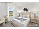 Bright bedroom with a comfortable bed and large window offering natural light at 8039 Plymouth Dr, Sherrills Ford, NC 28673