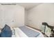 Spacious bedroom with double doors and a chair at 8039 Plymouth Dr, Sherrills Ford, NC 28673