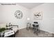 Bright office space with a glass desk and seating at 8039 Plymouth Dr, Sherrills Ford, NC 28673