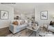 Open living room with comfortable seating and views into the kitchen at 8039 Plymouth Dr, Sherrills Ford, NC 28673