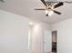 Spacious bedroom with ceiling fan and access to bathroom at 8047 Plymouth Dr, Sherrills Ford, NC 28673
