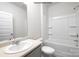 Clean bathroom with a bathtub, sink, and toilet at 8047 Plymouth Dr, Sherrills Ford, NC 28673