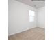 Bright bedroom with neutral carpeting and a window at 8047 Plymouth Dr, Sherrills Ford, NC 28673