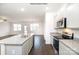 Open kitchen with granite countertops and stainless steel appliances at 8047 Plymouth Dr, Sherrills Ford, NC 28673