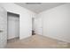 Bedroom with carpet flooring and a spacious closet at 8047 Plymouth Dr, Sherrills Ford, NC 28673
