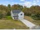 Two-story house with driveway and yard, aerial view at 1010 Kenton Pl, Salisbury, NC 28146