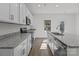 Modern kitchen with white cabinets, granite countertops and stainless steel appliances at 1010 Kenton Pl, Salisbury, NC 28146