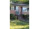 Brick house exterior with black shutters and steps at 1226 Fern Forest Dr, Gastonia, NC 28054