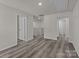 Spacious bonus room with hardwood floors and multiple doorways at 1403 Gentry Pl, Salisbury, NC 28146