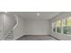 Bright living room with hardwood floors and large windows at 1403 Gentry Pl, Salisbury, NC 28146