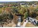 Aerial view of two-story house, new construction, wooded lot at 1403 Gentry Pl, Salisbury, NC 28146