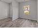 Bright office space with a large window and wood-look floors at 1403 Gentry Pl, Salisbury, NC 28146
