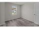 Charming bedroom with hardwood floors and a window at 1403 Gentry Pl, Salisbury, NC 28146