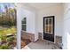 Front porch with black door and brick accents at 1403 Gentry Pl, Salisbury, NC 28146