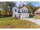 Two story home, white exterior, fall leaves, landscaping at 1403 Gentry Pl, Salisbury, NC 28146