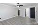 Main bedroom with private bathroom access and ceiling fan at 1554 Lynwood Dr, Lancaster, SC 29720