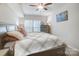 Spacious bedroom with a large bed, dresser and window at 25622 Seagull Dr # 645, Lancaster, SC 29720