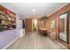 Dining Room with brick wall, laminate floor, and built-in shelving at 108 Leslie Dr, Shelby, NC 28152